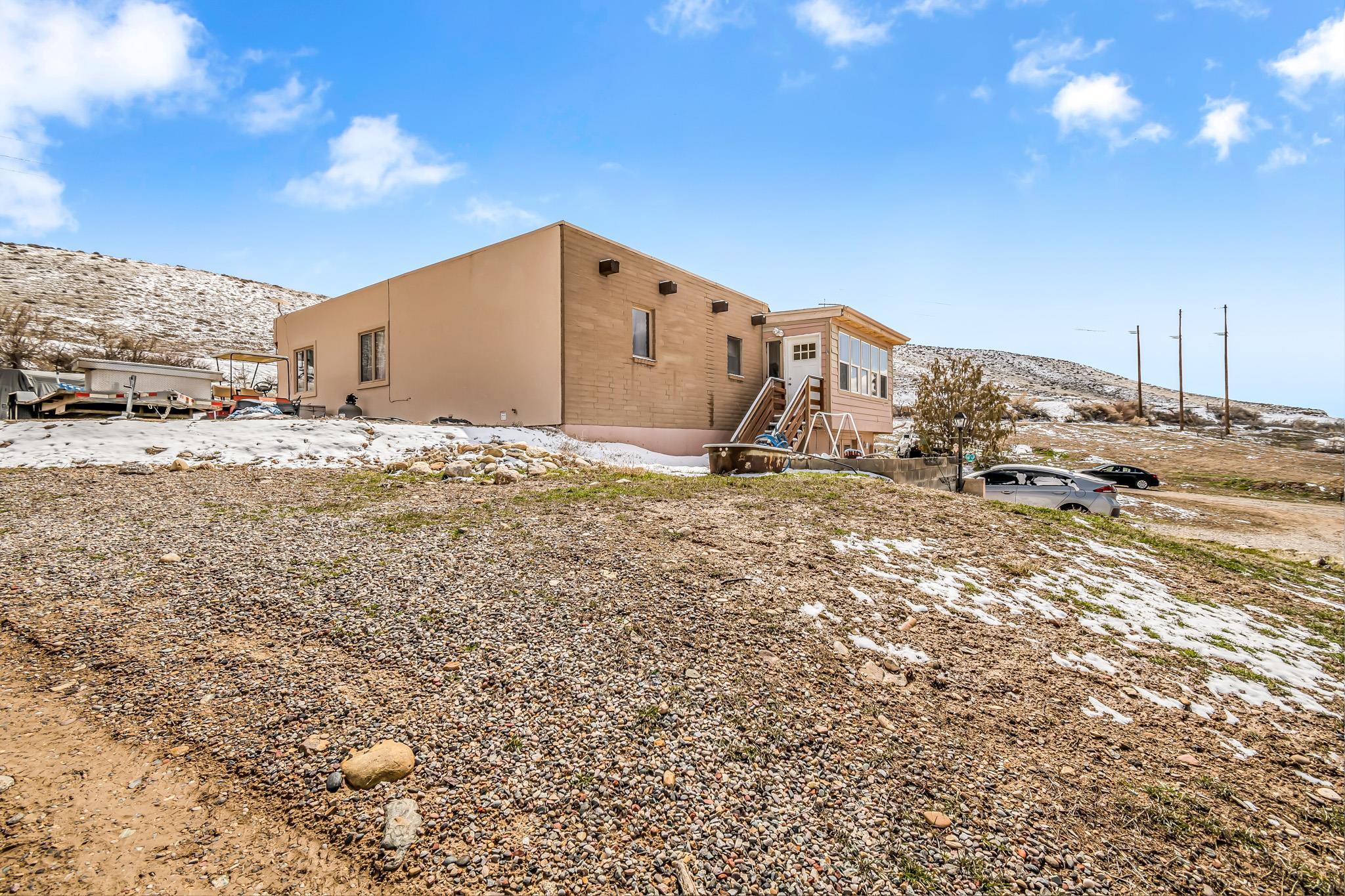 3553 1/2 E Road Palisade, CO 81526 - Photo 4 of 16 a view of a backyard of the house