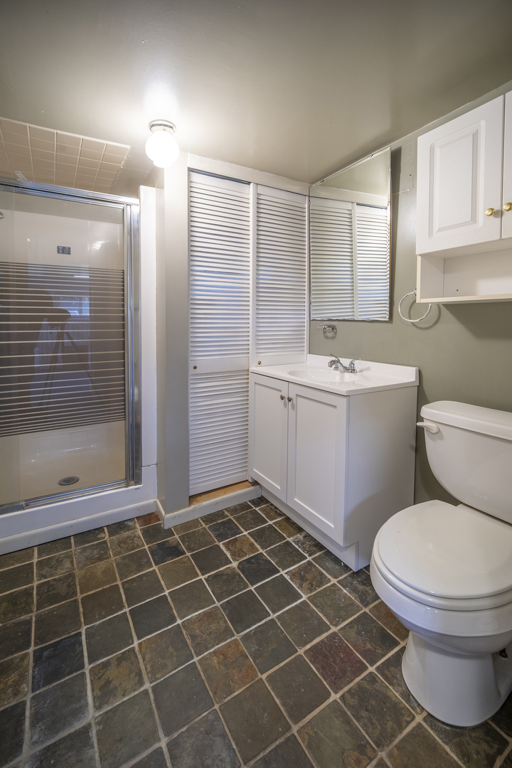 47 Briarcliff Road Montgomery, IL 60538 - Photo 16 of 19 a bathroom with a toilet a sink and a shower
