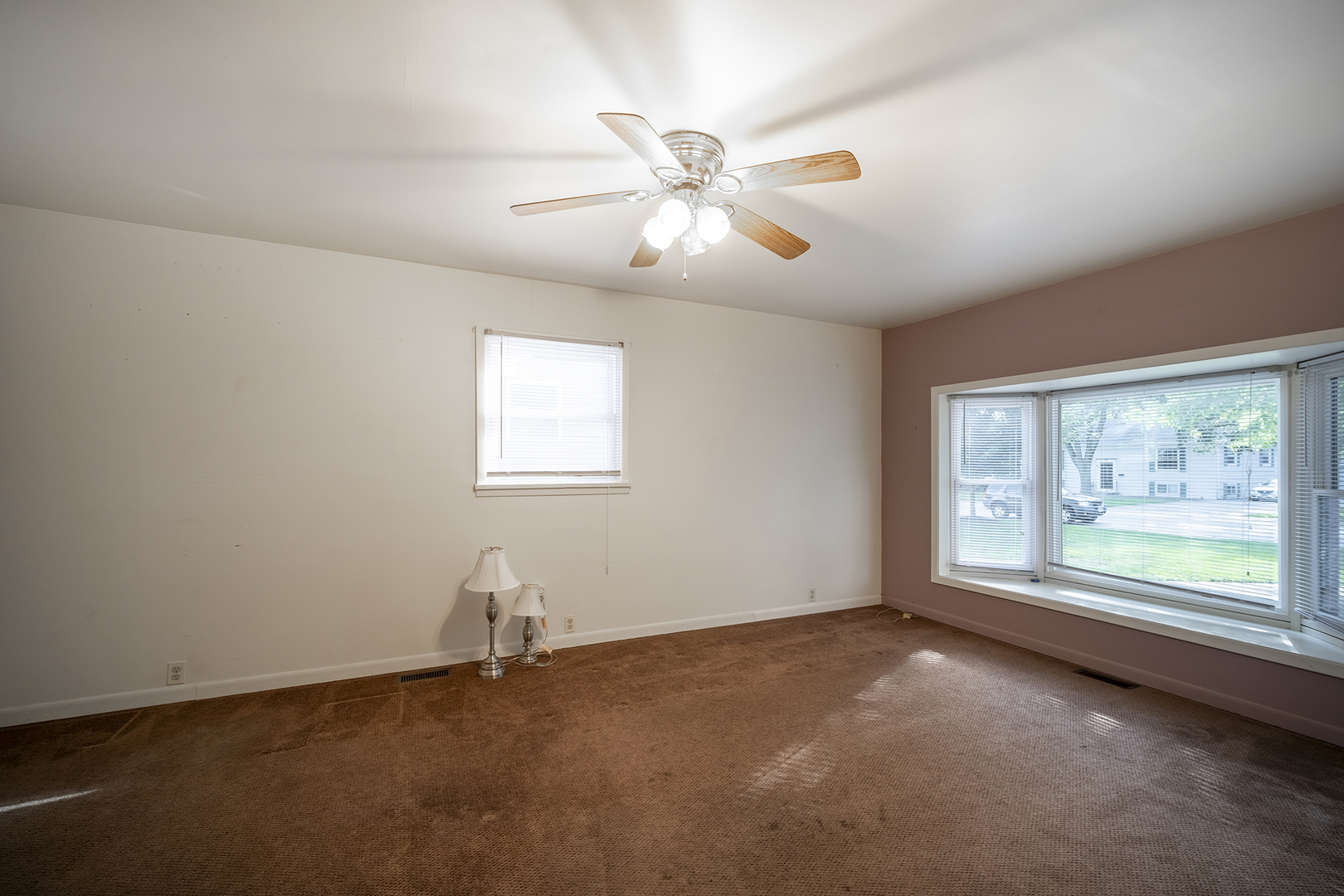 47 Briarcliff Road Montgomery, IL 60538 - Photo 8 of 19 a view of an empty room with a window