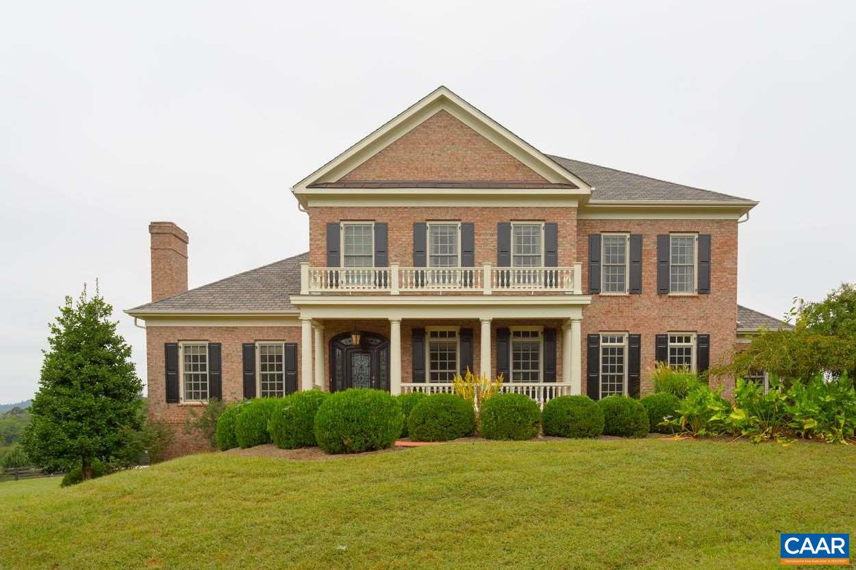 3140 Rocks Farm Court Charlottesville, VA 22903 - Photo 3 of 19 a front view of a house with garden