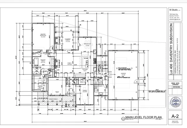 a bathroom with a bathtub and a picture on the wall