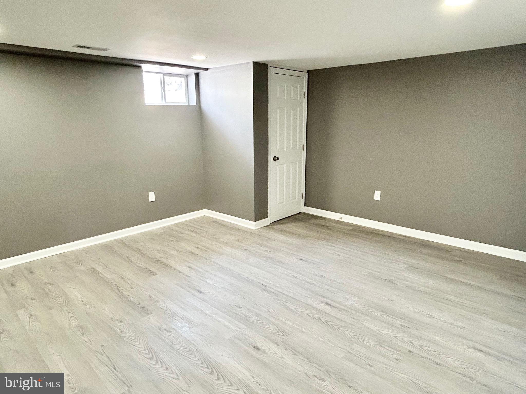 3506 Elmora Avenue Baltimore, MD 21213 - Photo 21 of 27 wooden floor in a room