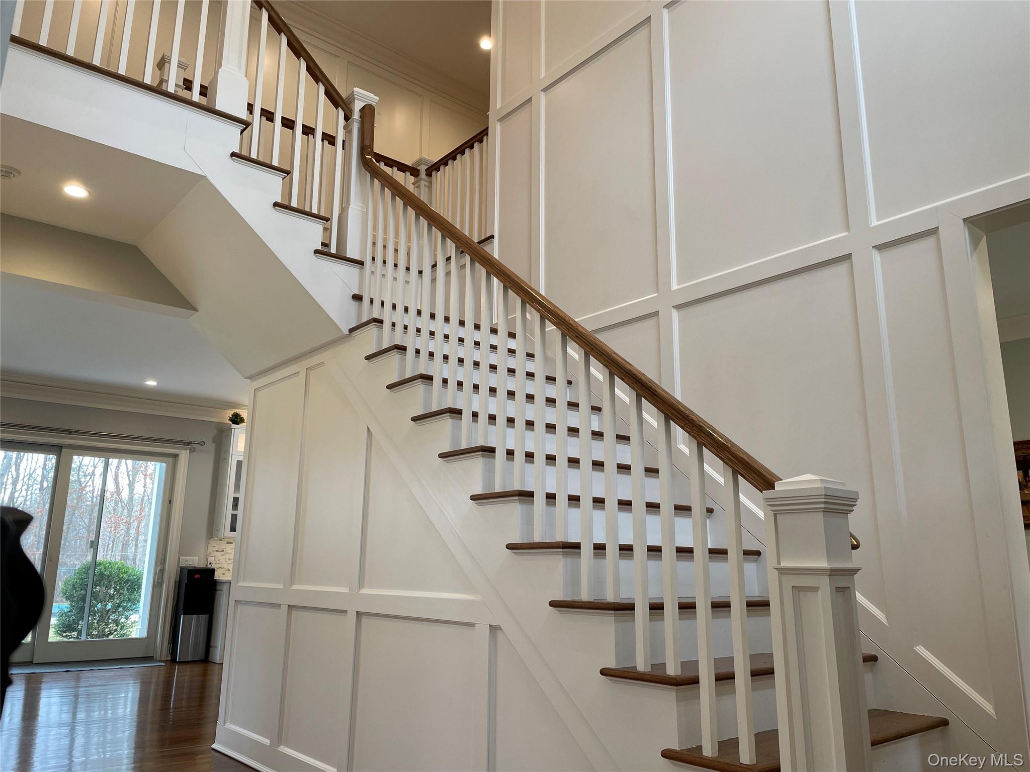 99 Spinney Road East Quogue, NY 11942 - Photo 18 of 40 a view of entryway with wooden floor
