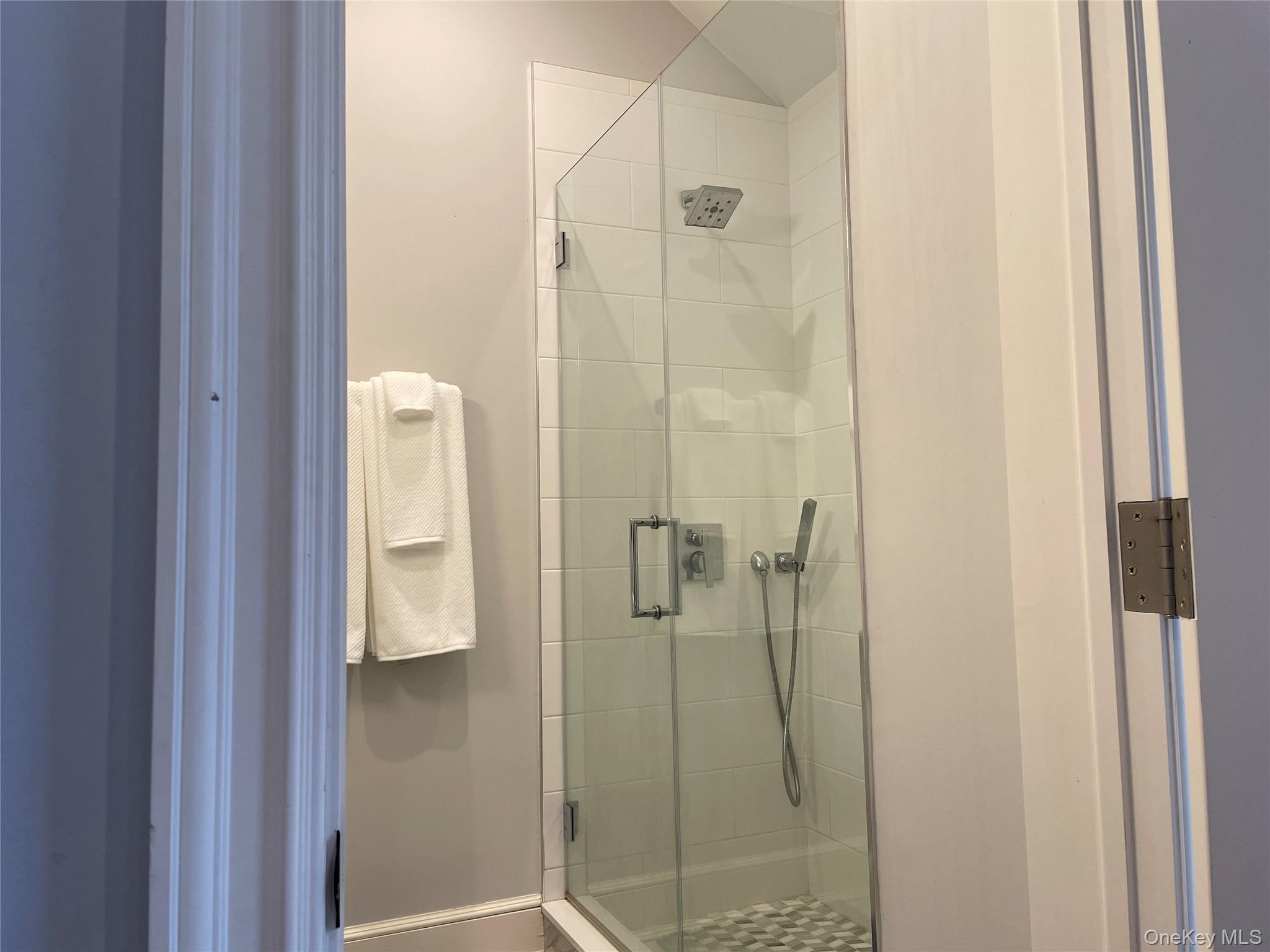 99 Spinney Road East Quogue, NY 11942 - Photo 26 of 40 a bathroom with a shower