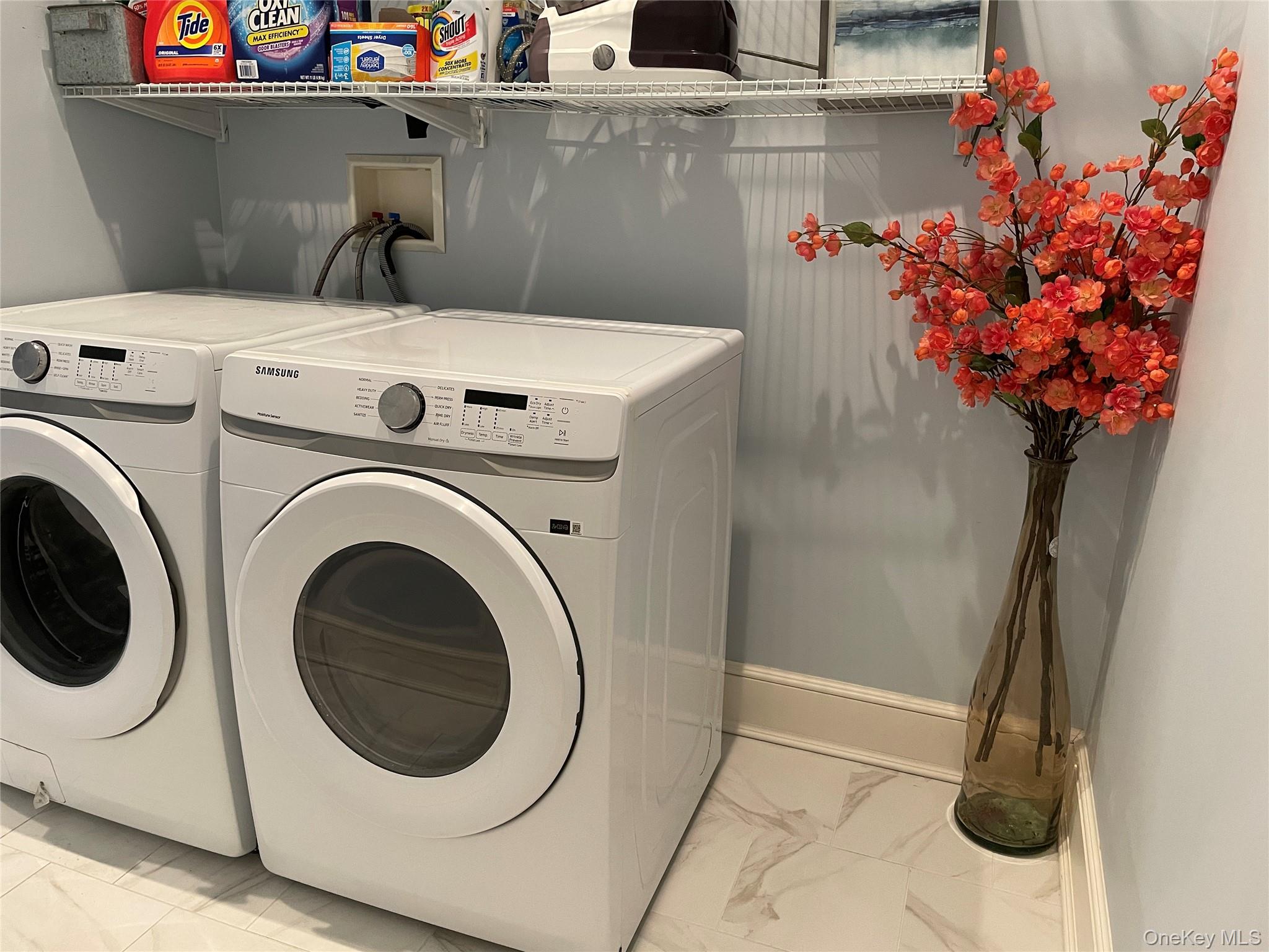 99 Spinney Road East Quogue, NY 11942 - Photo 29 of 40 a utility room with dryer and washer