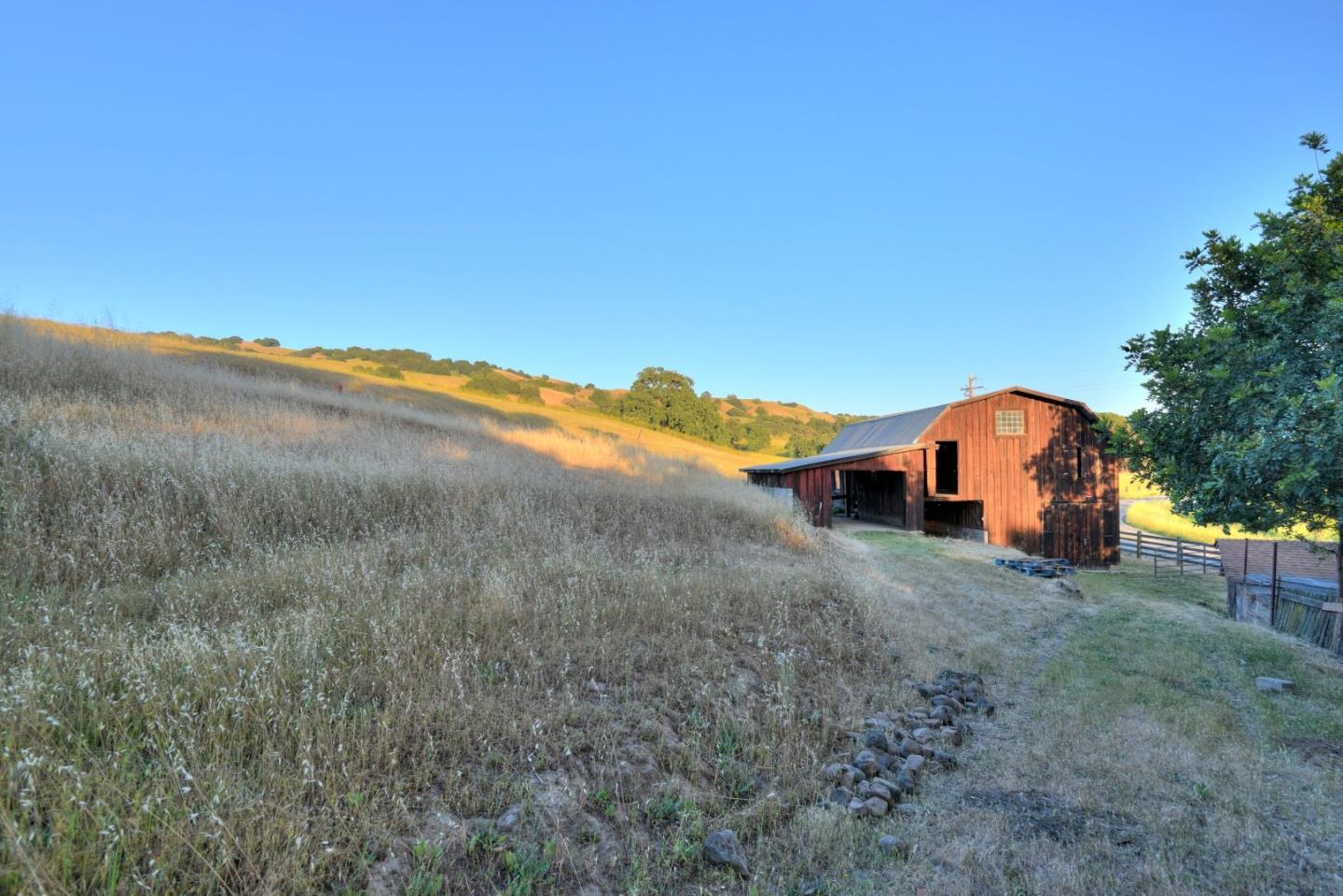 7700 Crews Road Gilroy, CA 95020 - Photo 22 of 28 a view of a house with a yard