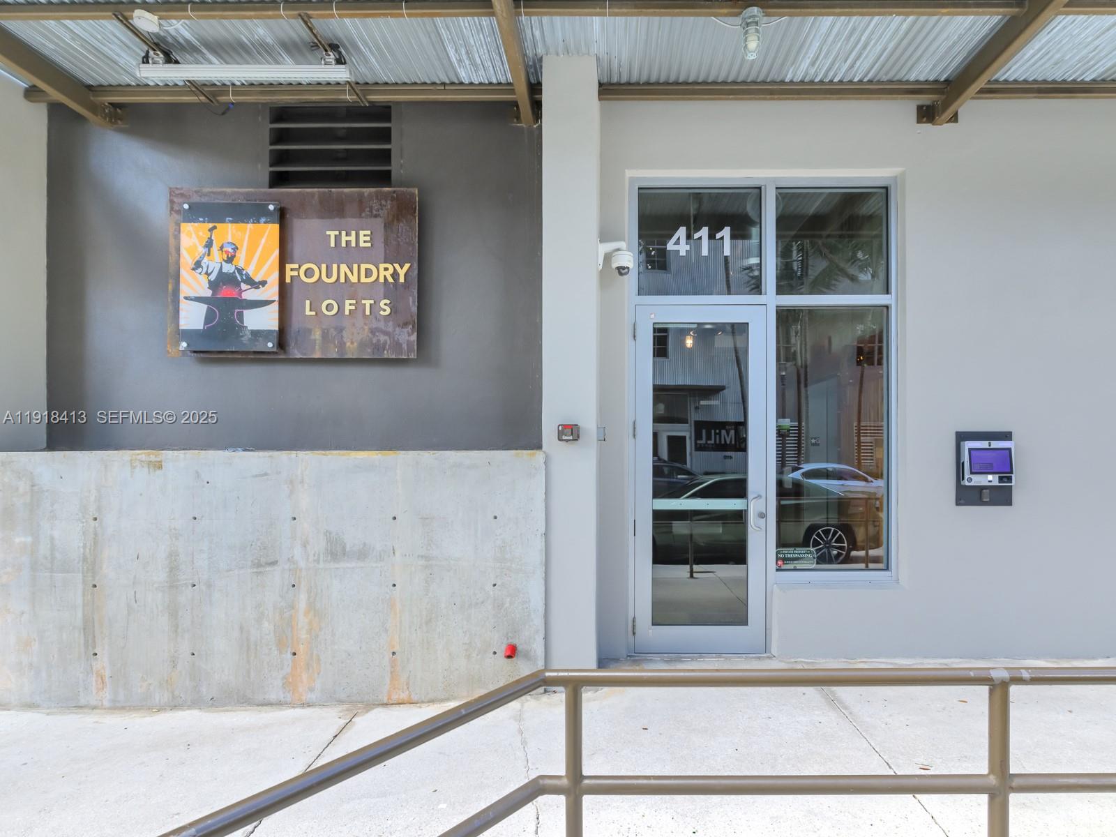 411 Northwest 1st Avenue, Unit 401 Fort Lauderdale, FL 33301 - Photo 3 of 53 a view of a door of the house