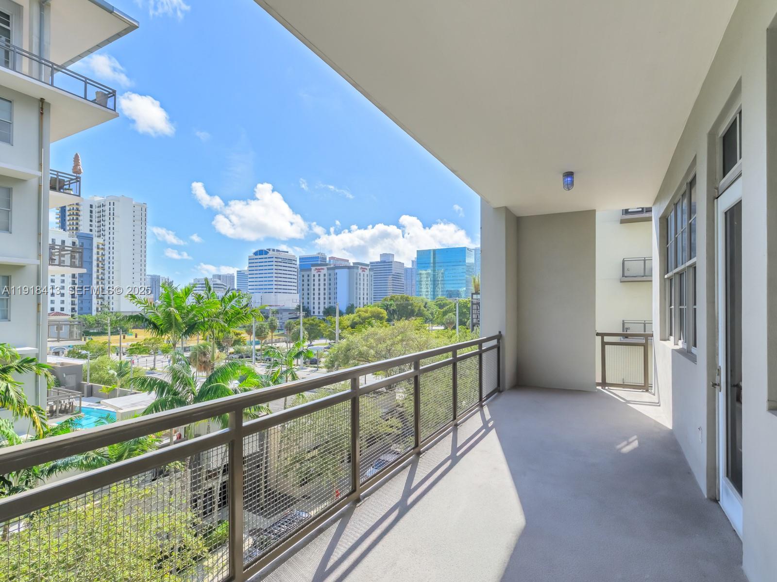 411 Northwest 1st Avenue, Unit 401 Fort Lauderdale, FL 33301 - Photo 33 of 53 a view of balcony with a potted plant