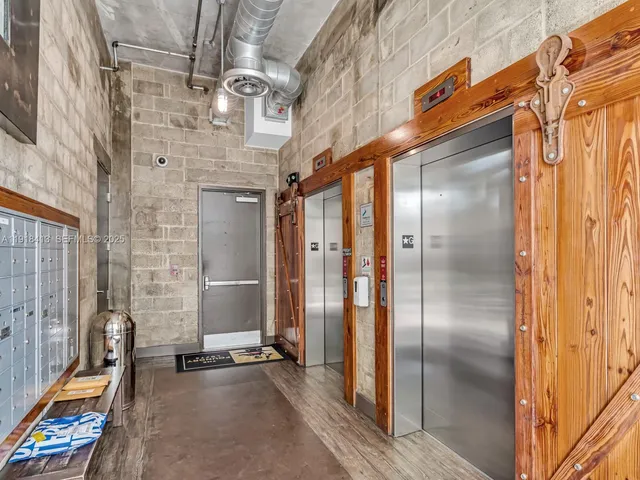 a sign board with a mirror