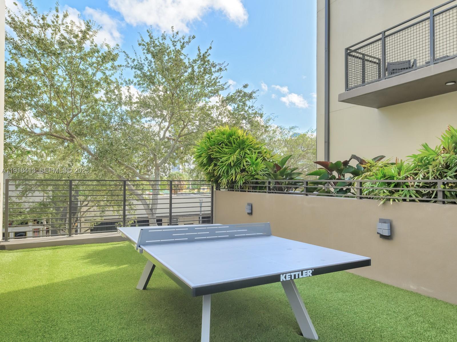 411 Northwest 1st Avenue, Unit 401 Fort Lauderdale, FL 33301 - Photo 43 of 53 a patio with water view and a yard