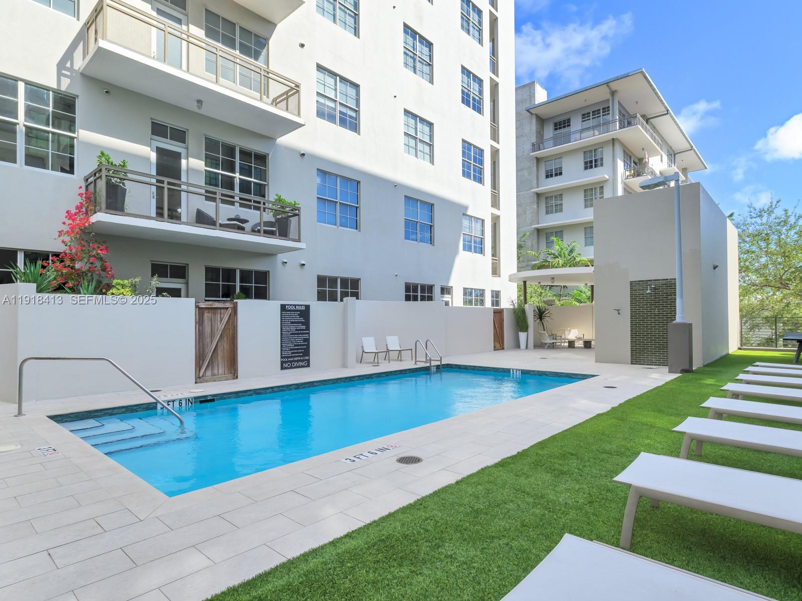 411 Northwest 1st Avenue, Unit 401 Fort Lauderdale, FL 33301 - Photo 45 of 53 a view of a building with a yard