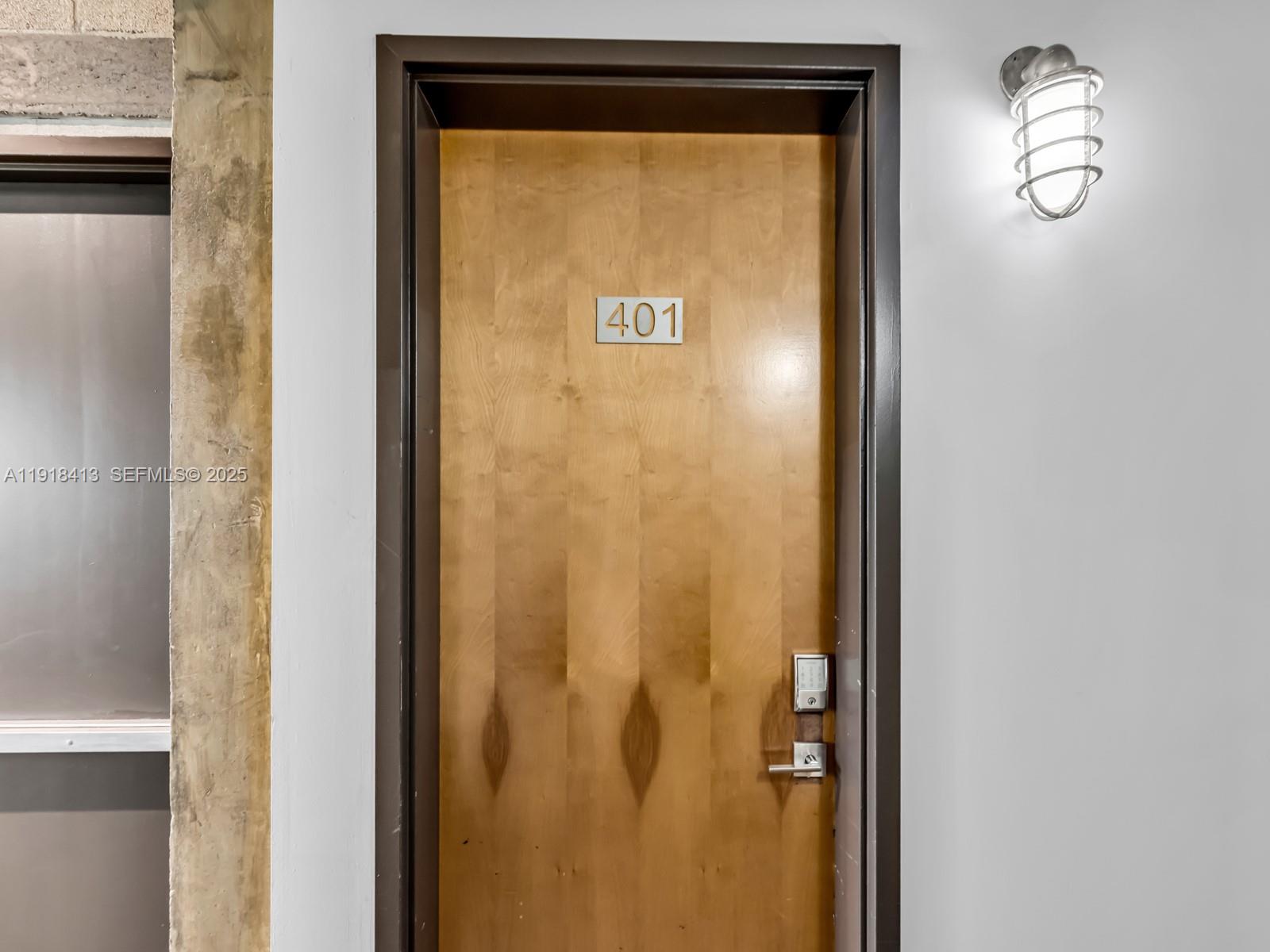 411 Northwest 1st Avenue, Unit 401 Fort Lauderdale, FL 33301 - Photo 6 of 53 a sign board with a mirror