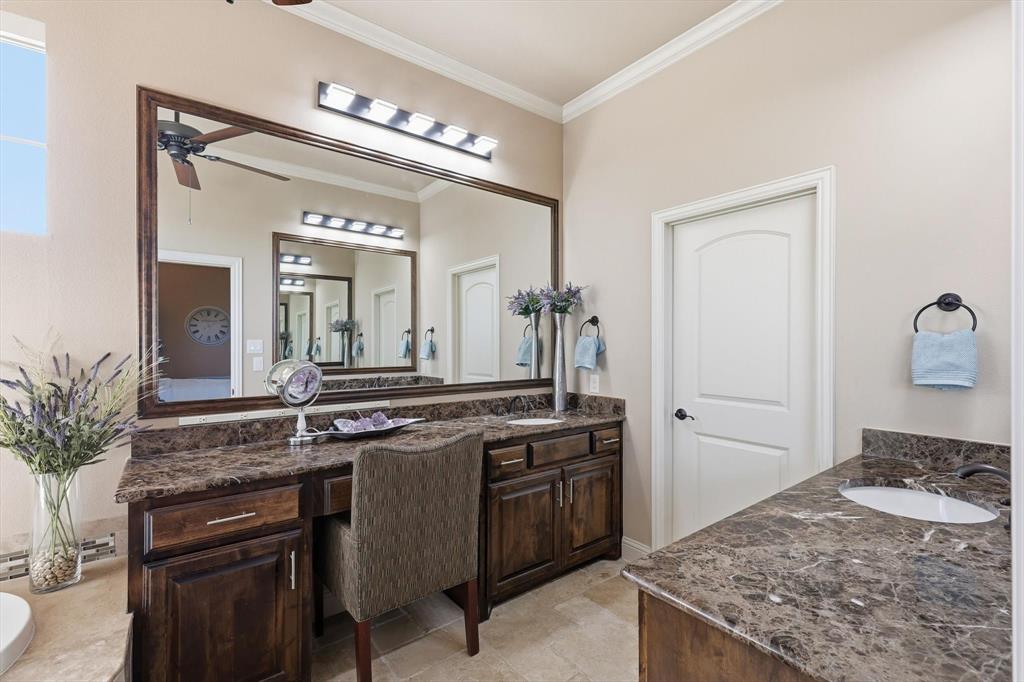 617 Two Creeks Plaza Richardson, TX 75080 - Photo 19 of 40 a kitchen with a sink and stove