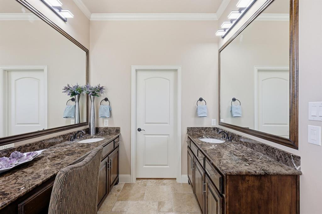 617 Two Creeks Plaza Richardson, TX 75080 - Photo 20 of 40 a bathroom with a granite countertop sink and a mirror