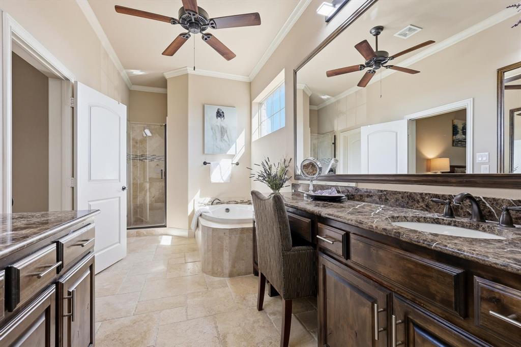 617 Two Creeks Plaza Richardson, TX 75080 - Photo 22 of 40 a spacious bathroom with a granite countertop sink mirror and a