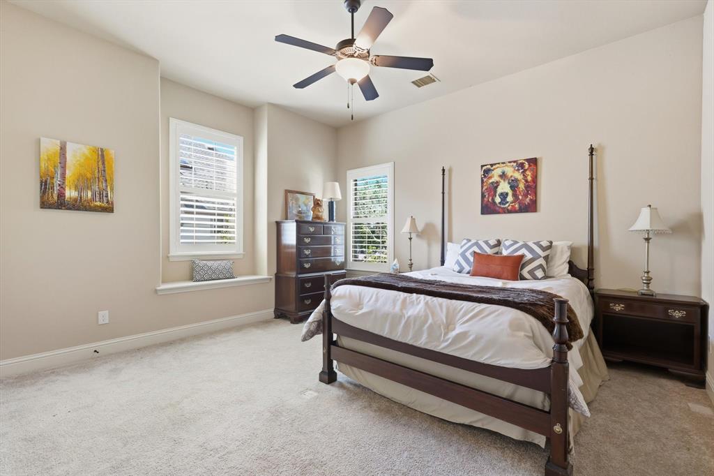 617 Two Creeks Plaza Richardson, TX 75080 - Photo 26 of 40 a bed sitting in a spacious bedroom next to a window