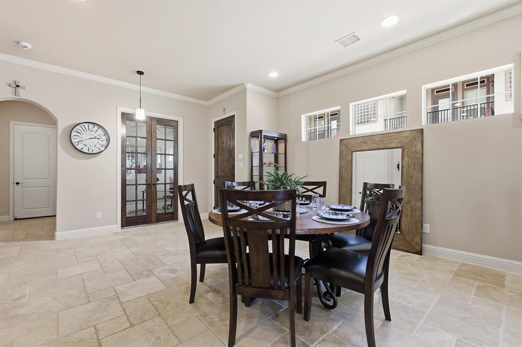 617 Two Creeks Plaza Richardson, TX 75080 - Photo 7 of 40 a view of a dining room that has a table and chairs