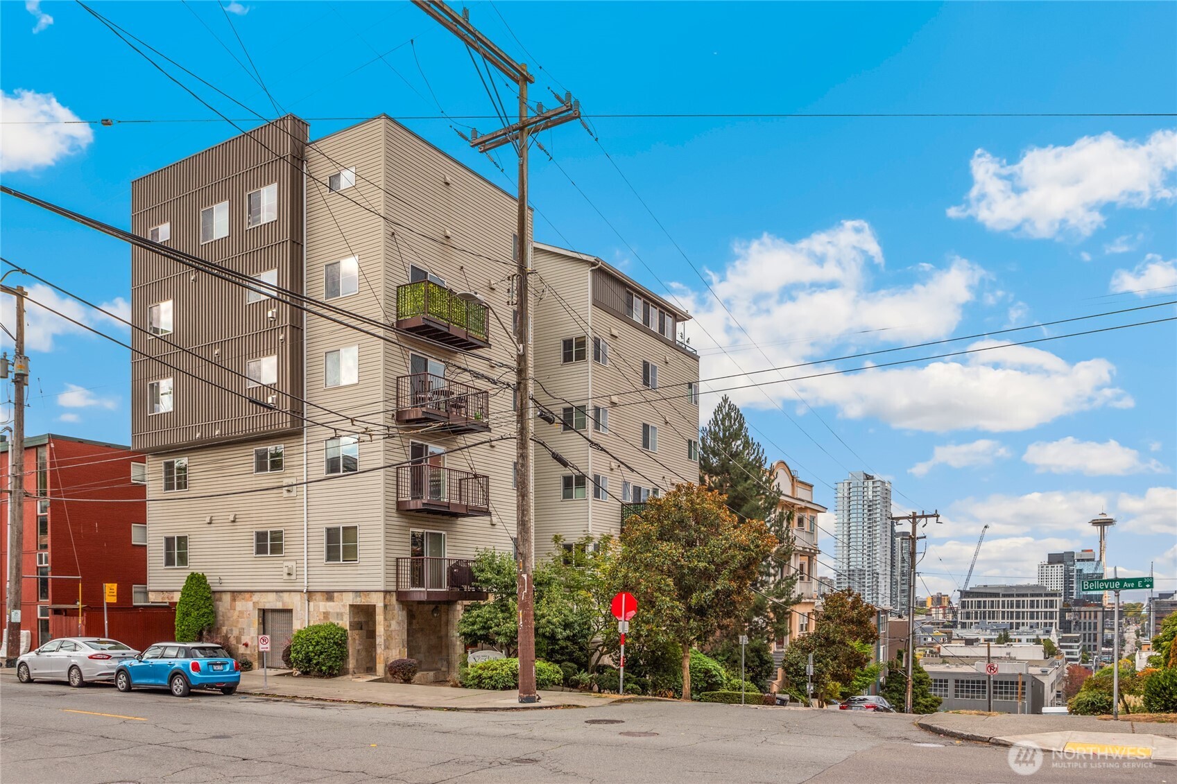 321 East Thomas Street, Unit 303 Seattle, WA 98102 - Photo 19 of 24 a city street lined with tall buildings