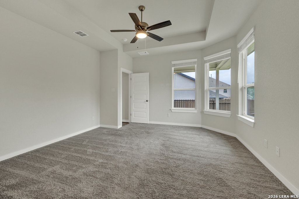 1433 Escarpment Road New Braunfels, TX 78132 - Photo 19 of 37 a view of an empty room with a window