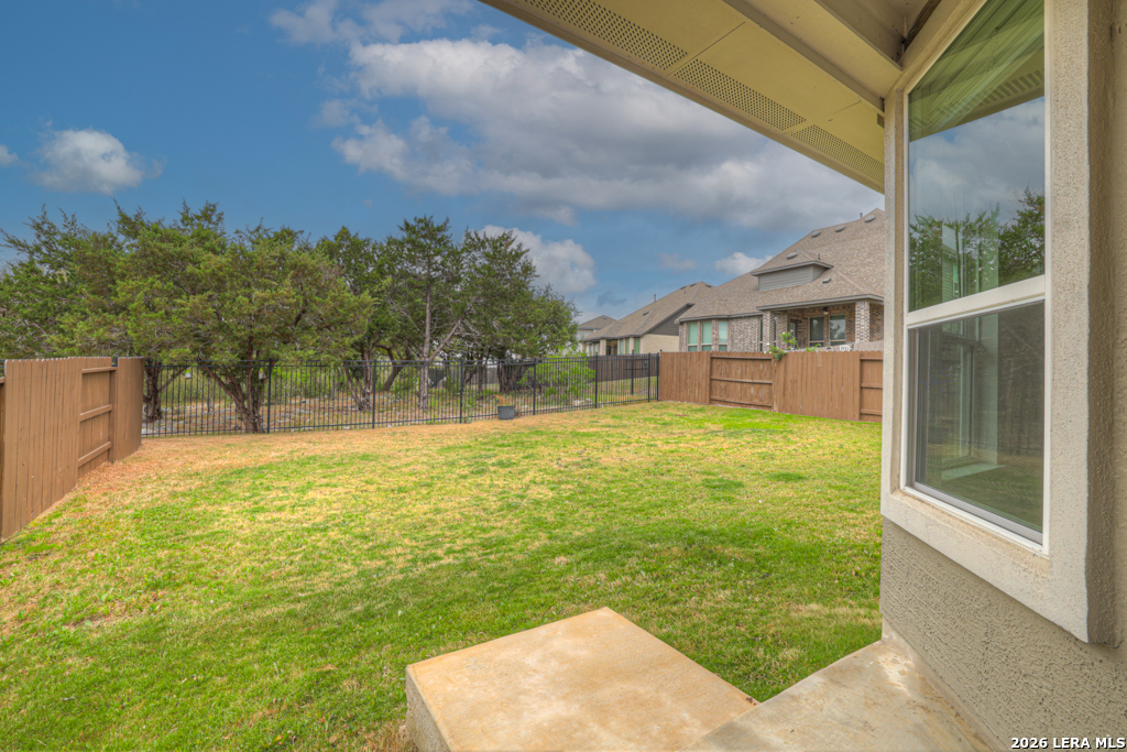 1433 Escarpment Road New Braunfels, TX 78132 - Photo 28 of 37 a house view with swimming pool in front of it