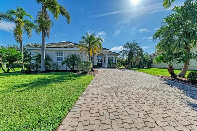 a view of a yard and a patio