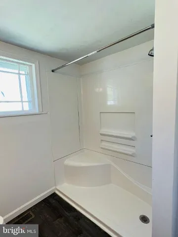 a bathroom with a bathtub