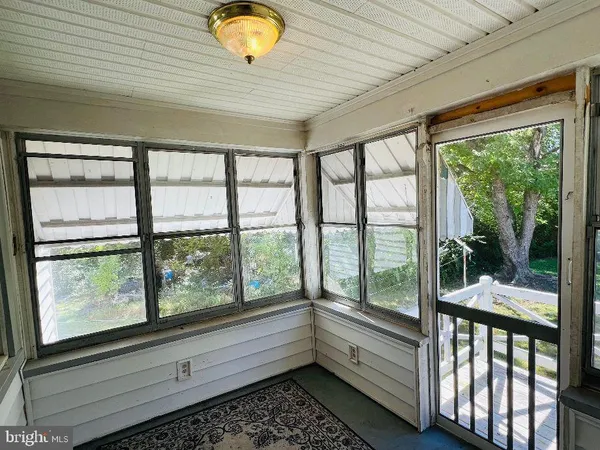 a view of a room and window
