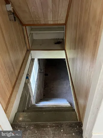 a view of parking garage with cars