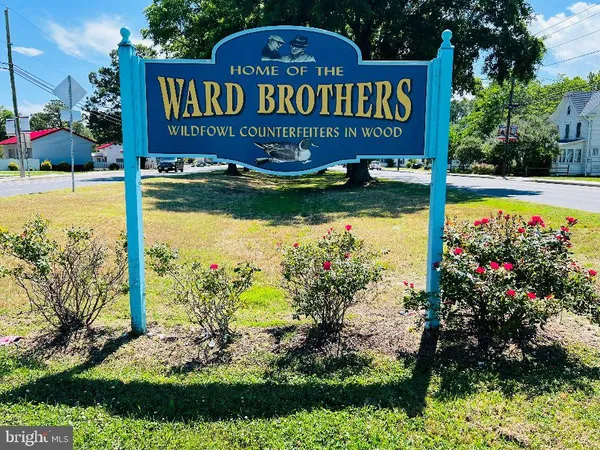 a view of a living room with a bed