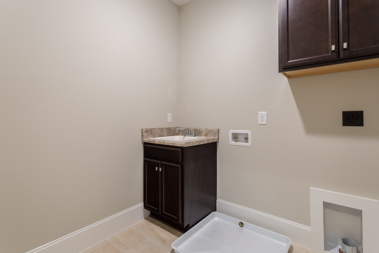 4613 Pleasant Pointe Way Raleigh, NC 27613 - Photo 24 of 25 Sink in laundry room