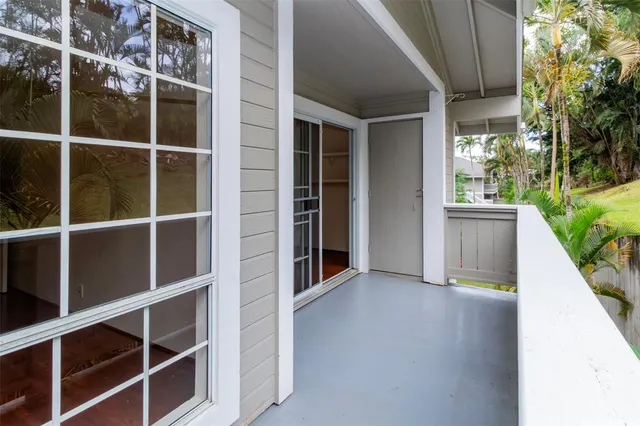 a view of a house with a large window and a large window