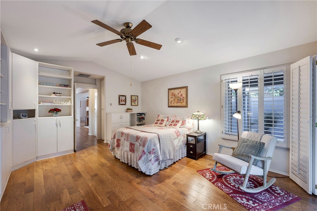 40370 Vía Francisco Murrieta, CA 92562 - Photo 20 of 52 a bedroom with a bed and wooden floor