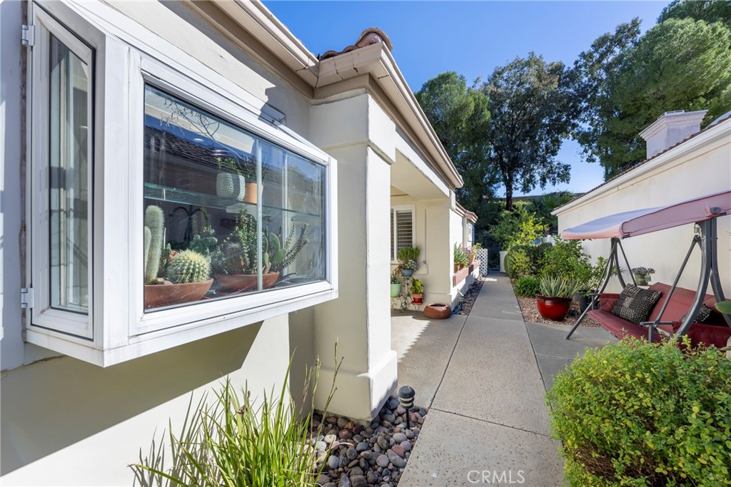 40370 Vía Francisco Murrieta, CA 92562 - Photo 28 of 52 a view of a house with sitting area and garden