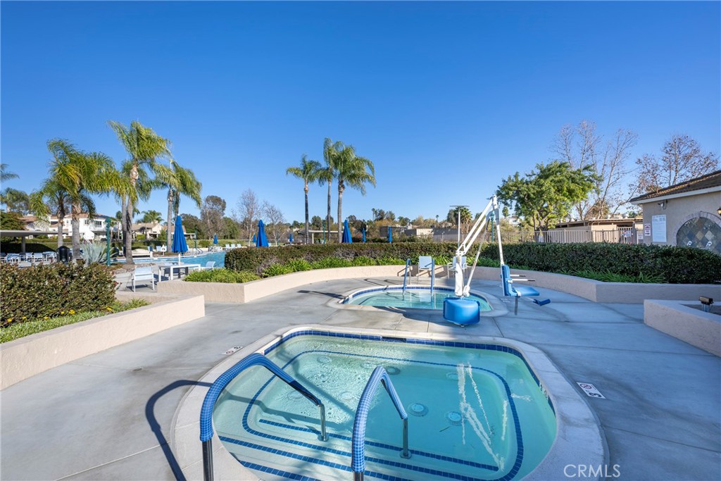 40370 Vía Francisco Murrieta, CA 92562 - Photo 35 of 52 a view of a swimming pool and outdoor space