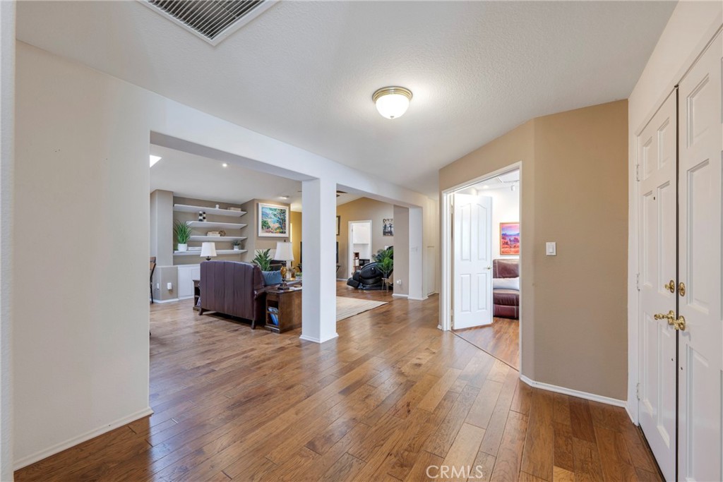 40370 Vía Francisco Murrieta, CA 92562 - Photo 8 of 52 a view of a livingroom with wooden floor and furniture