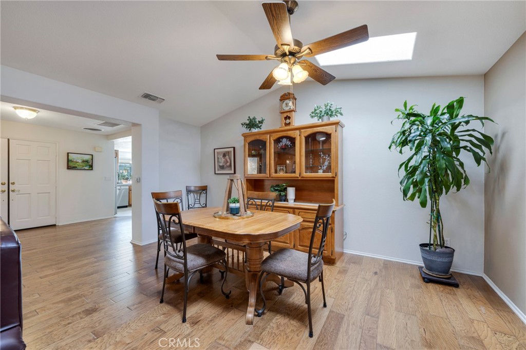 40370 Vía Francisco Murrieta, CA 92562 - Photo 9 of 52 a view of a dining room with furniture and wooden floor