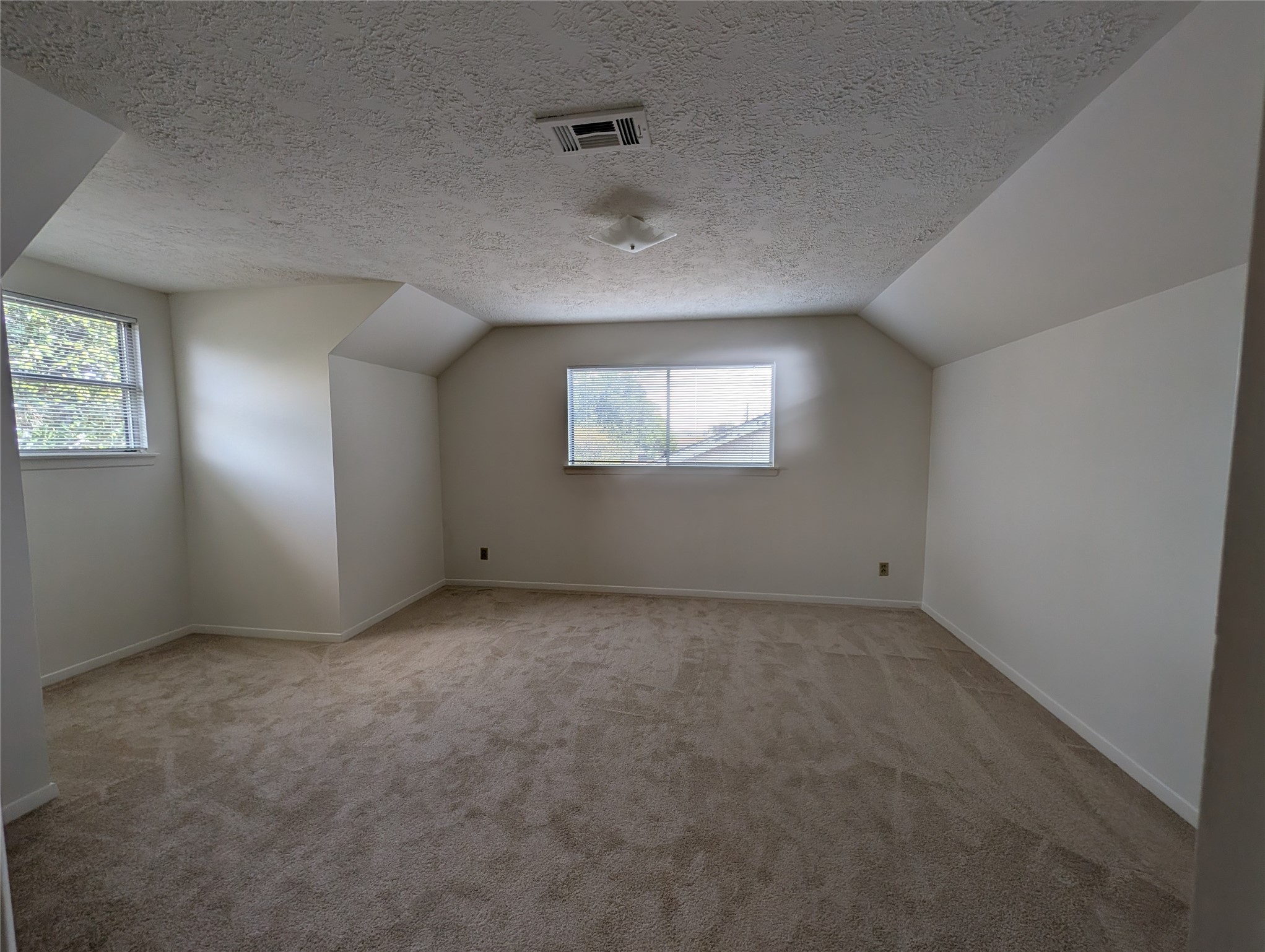322 Ravenhead Drive Houston, TX 77034 - Photo 12 of 16 an empty room with windows