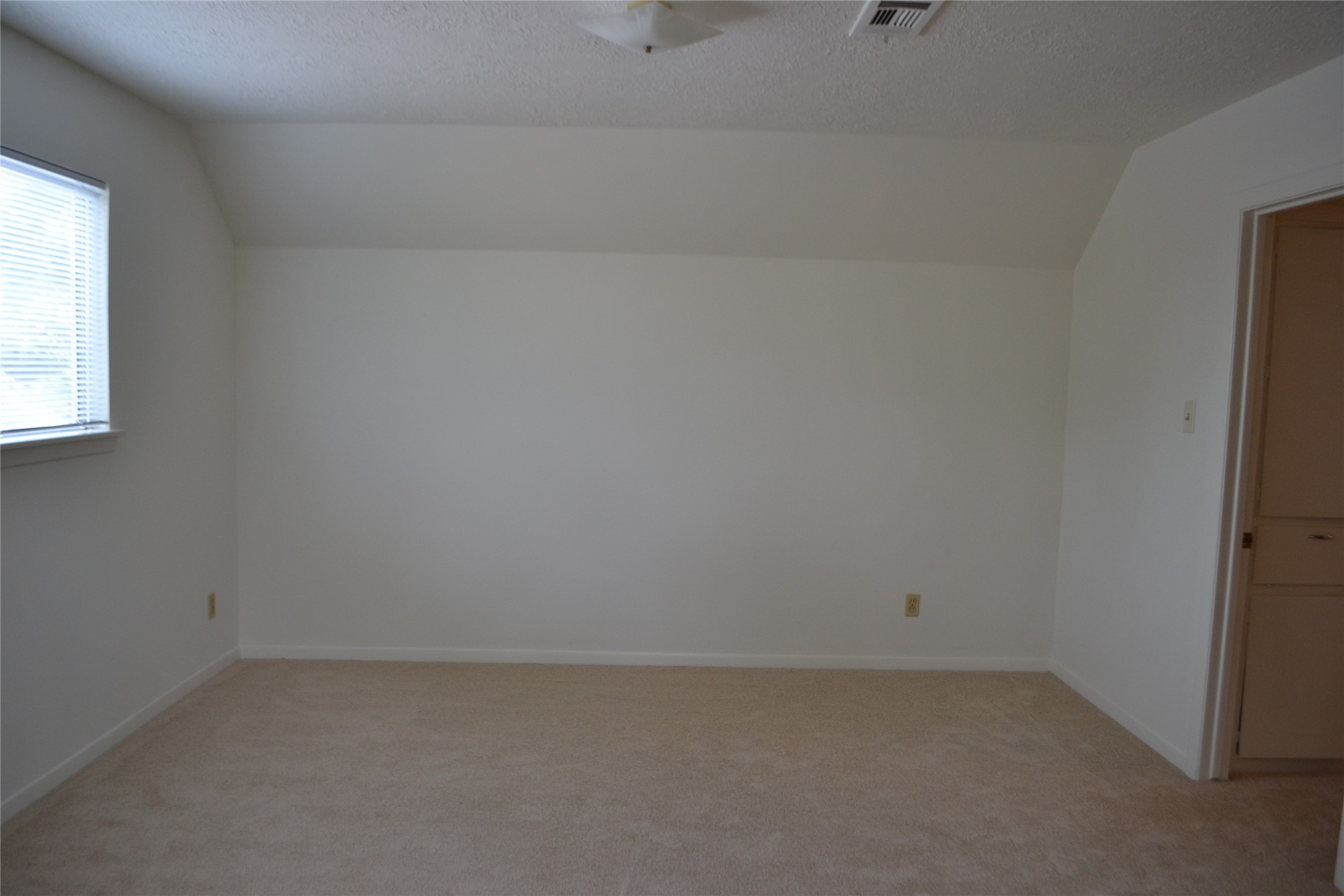 322 Ravenhead Drive Houston, TX 77034 - Photo 14 of 16 a room that has a window in it
