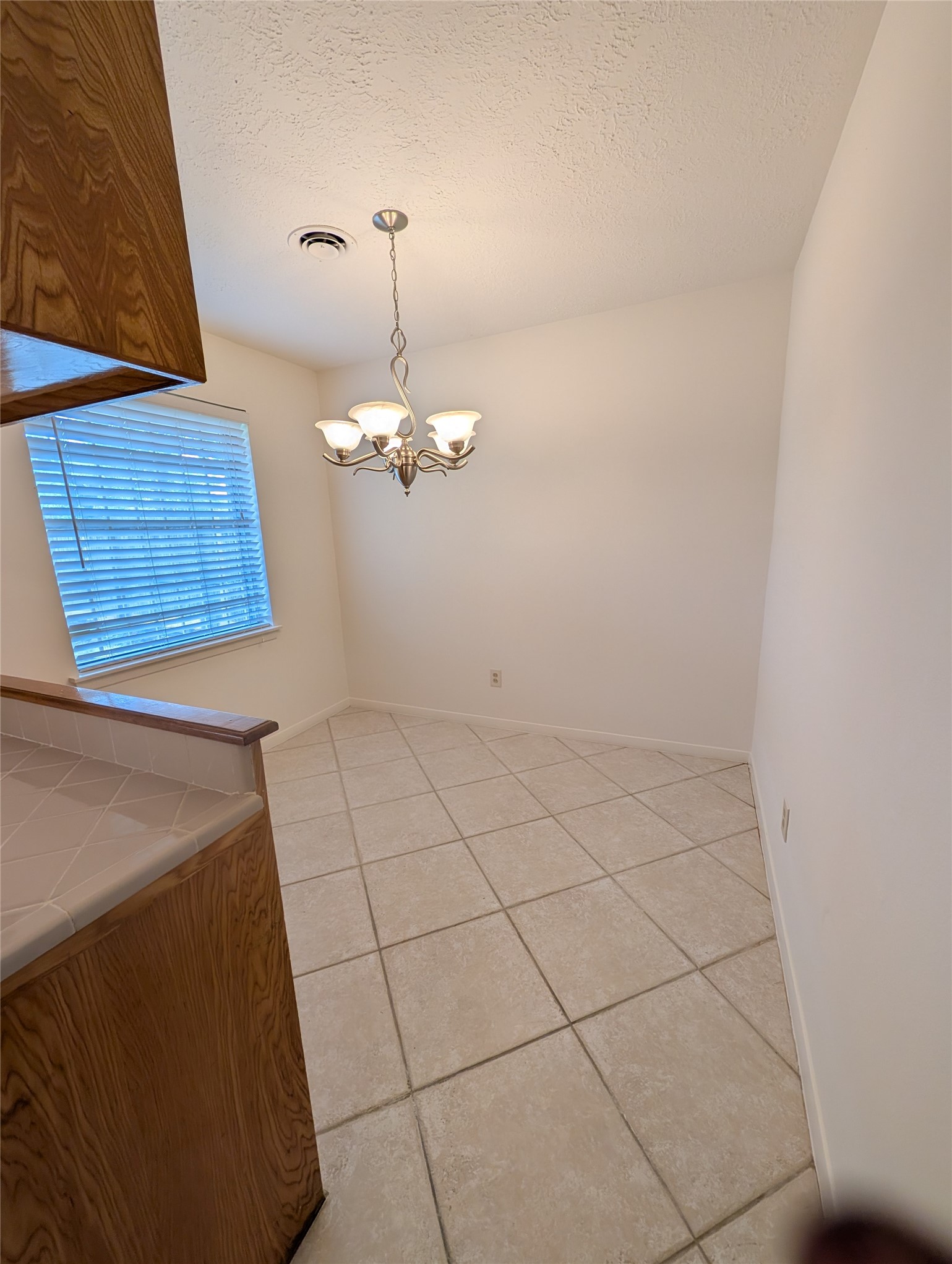 322 Ravenhead Drive Houston, TX 77034 - Photo 10 of 16 a view of empty room with a sink