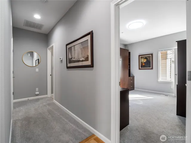 a view of a hallway with front door