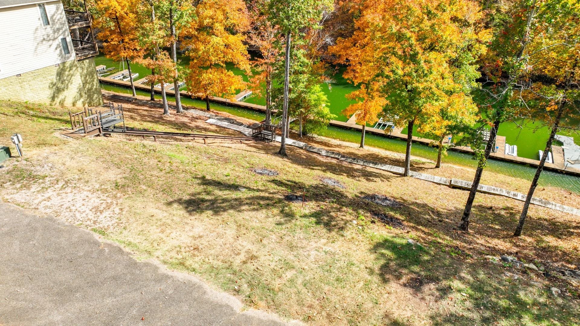 3 Breeze Point Savannah, TN 38372 - Photo 17 of 21 a view of a yard with wooden fence