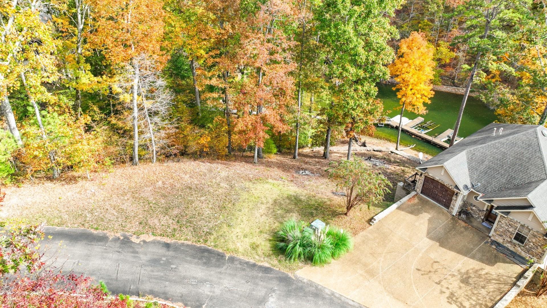 3 Breeze Point Savannah, TN 38372 - Photo 9 of 21 a view of backyard with large trees