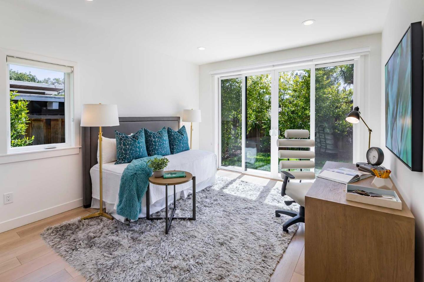 285 West Charleston Road Palo Alto, CA 94306 - Photo 11 of 25 a living room with furniture and a floor to ceiling window