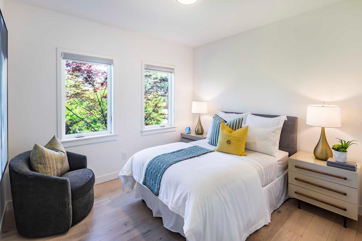 285 West Charleston Road Palo Alto, CA 94306 - Photo 14 of 25 a bedroom with bed couch and window