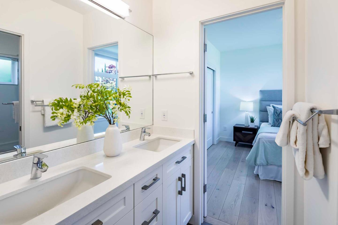 285 West Charleston Road Palo Alto, CA 94306 - Photo 15 of 25 a spacious bathroom with a double vanity sink and a mirror