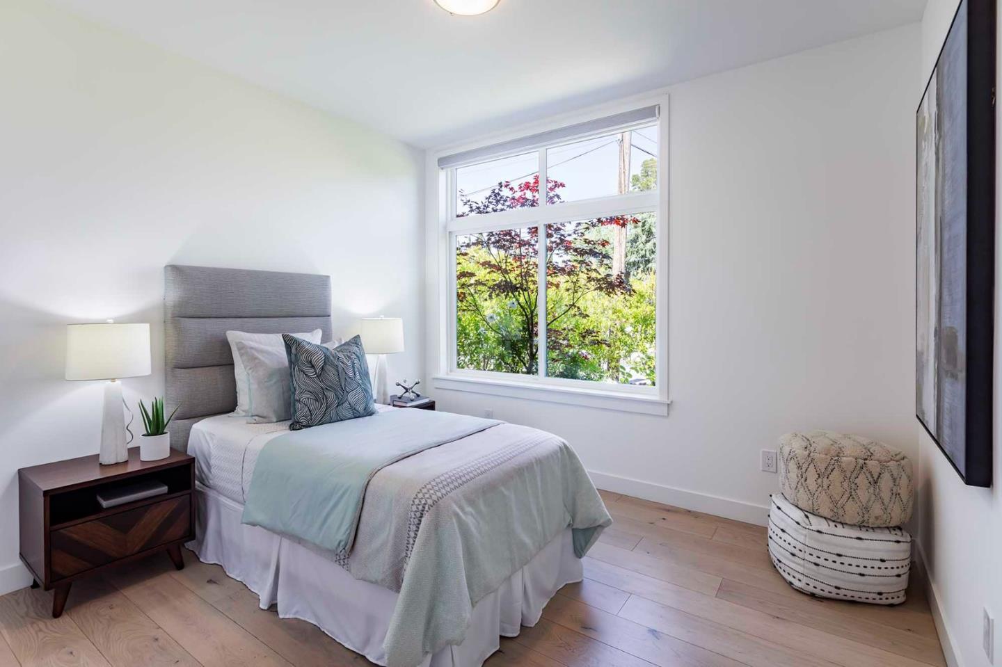 285 West Charleston Road Palo Alto, CA 94306 - Photo 17 of 25 a bedroom with a bed and a window