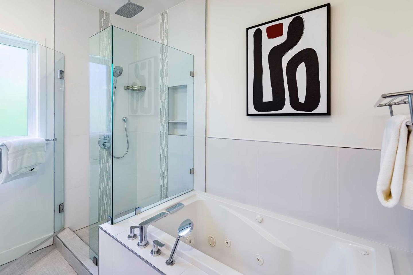 285 West Charleston Road Palo Alto, CA 94306 - Photo 22 of 25 a bathroom with a tub and a shower