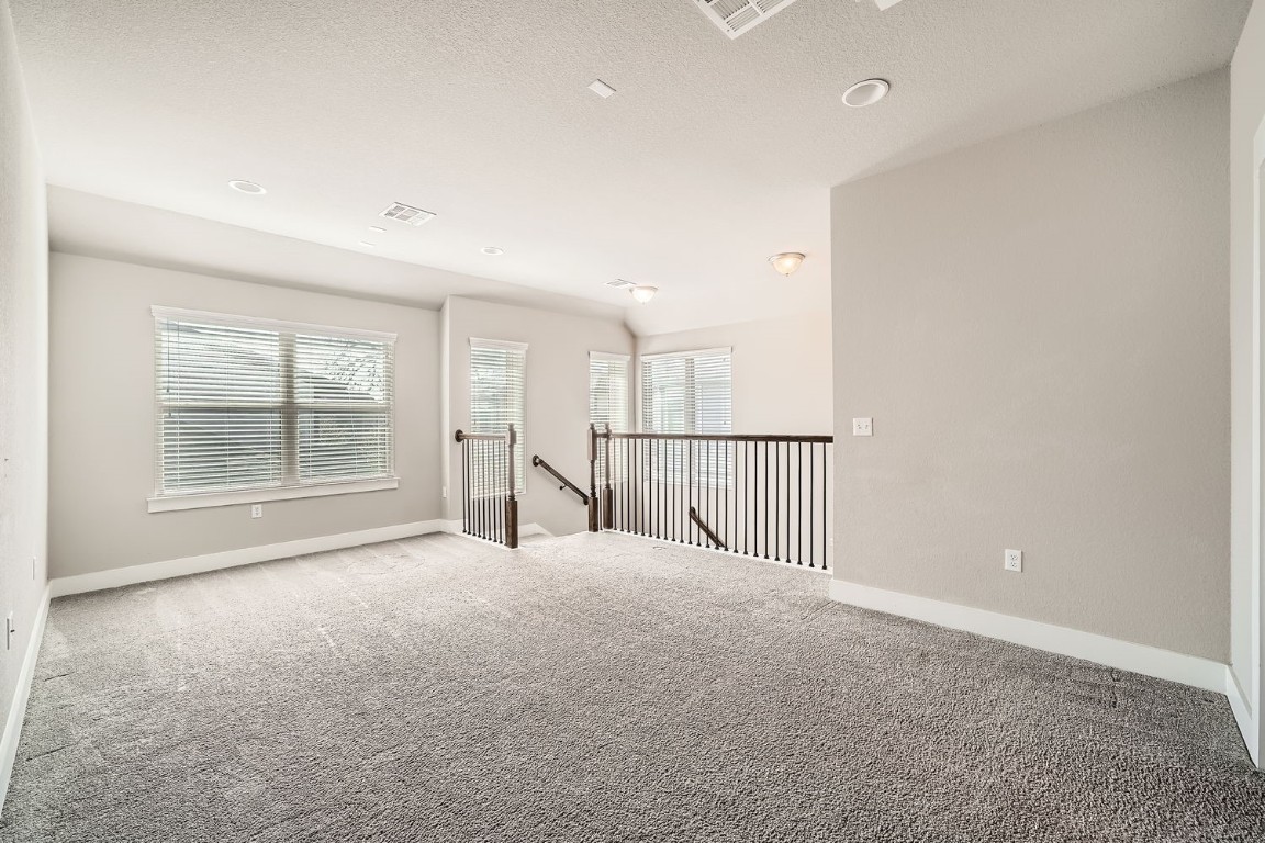 14709 Stillman Bend, Unit 52 Austin, TX 78717 - Photo 20 of 28 a view of an empty room with a window