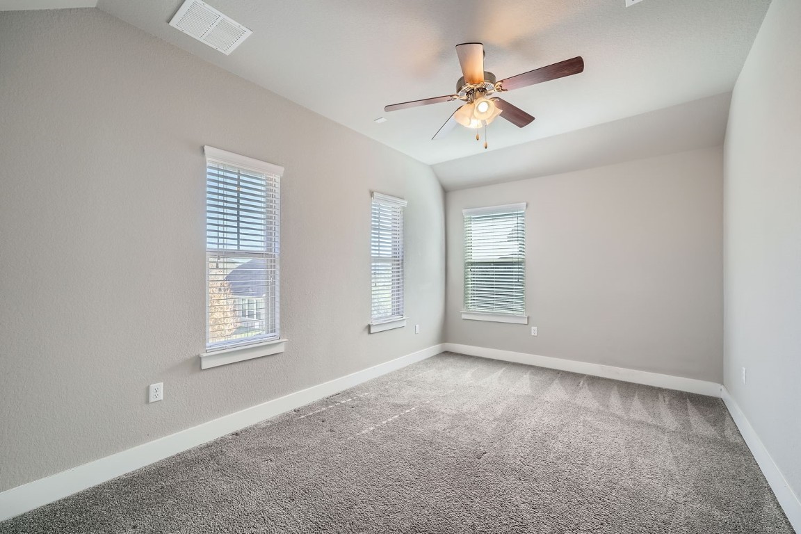 14709 Stillman Bend, Unit 52 Austin, TX 78717 - Photo 21 of 28 a view of an empty room with a window
