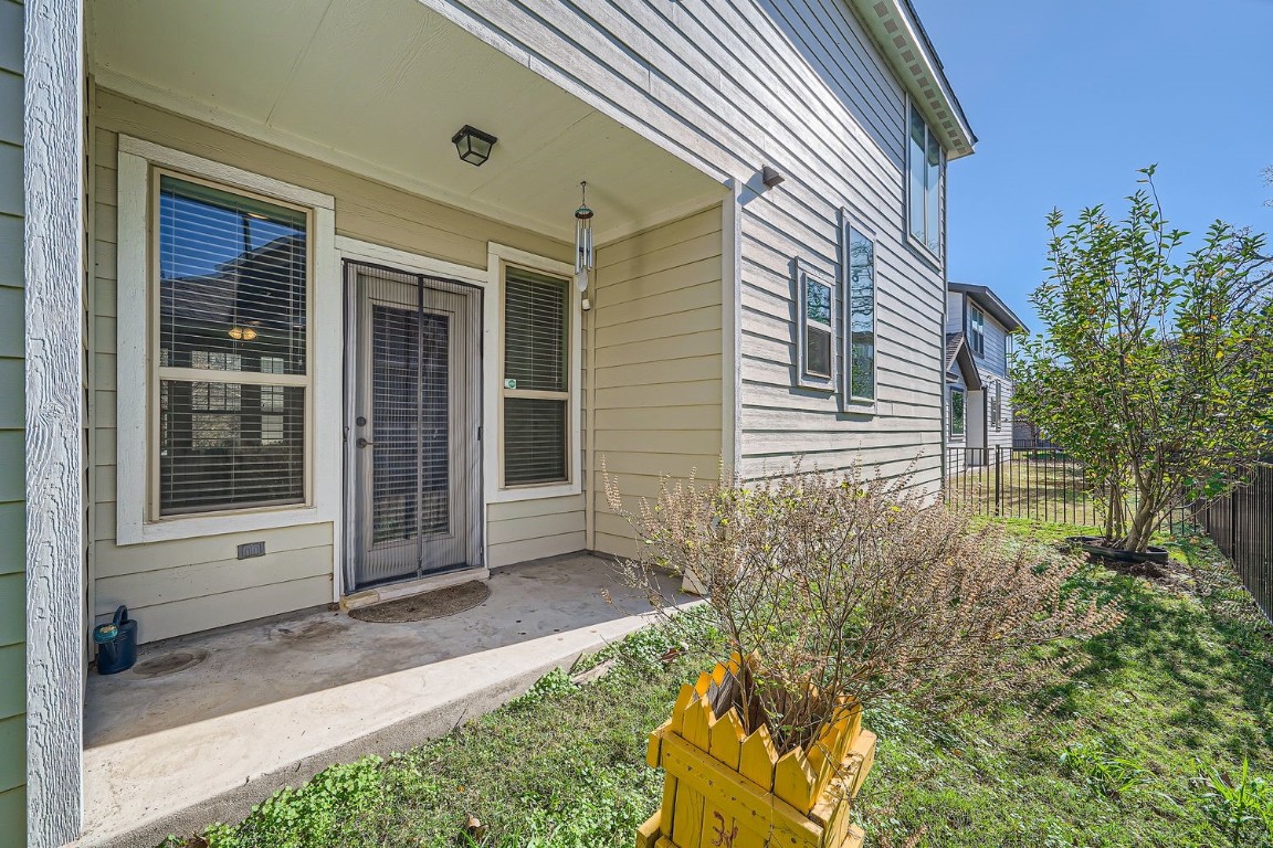 14709 Stillman Bend, Unit 52 Austin, TX 78717 - Photo 27 of 28 a view of house with backyard